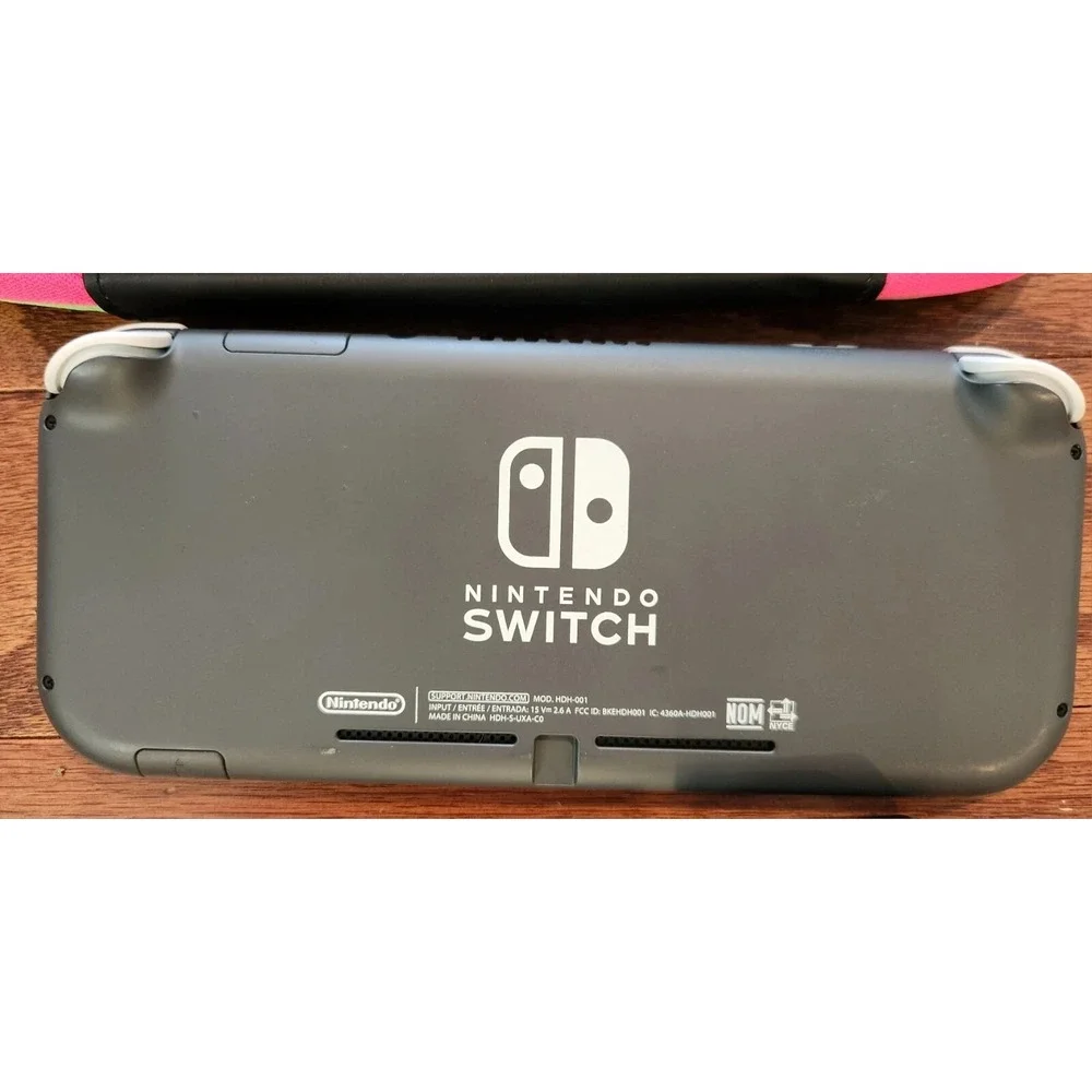 Nintendo Switch Lite Gray Console w/ Case + Mario Wonder Game